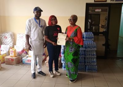 Children’s Day celebration outreach award presented to Real Help Orphanage Home by CWAY Representative and LHCHF Director Of operation Dr Francisca Odeka -26th May 2023