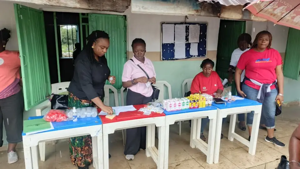 The public health department setting up the drugs and health care testing tools in preparation for the event.