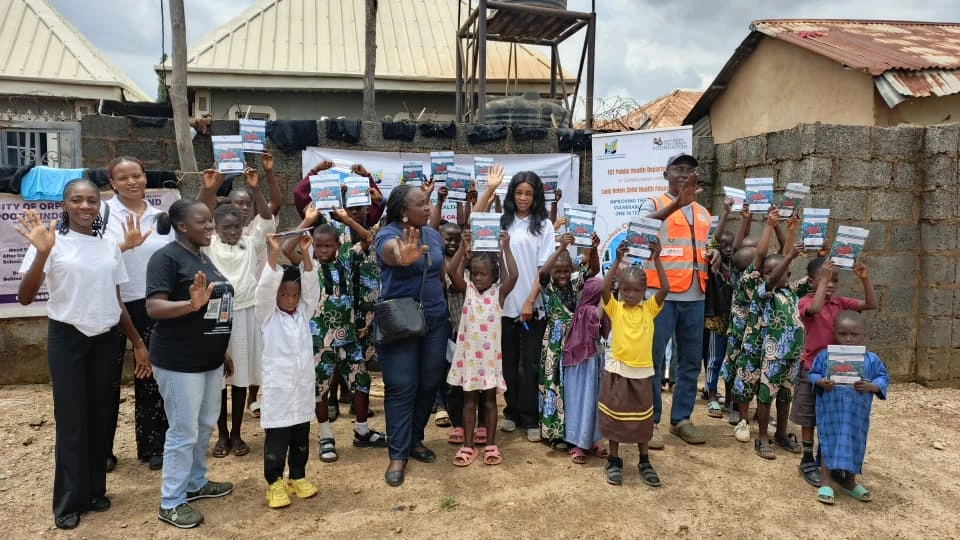 The children of City of Orphanage care home showing the gifts they received from the FCT childhood TB Focal Person, Dr Titilayo