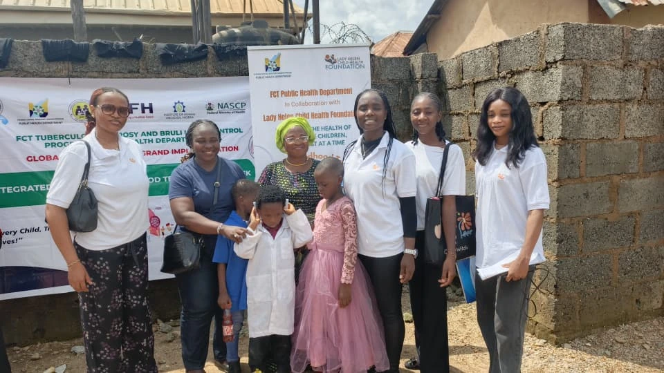 LHCHF staff and volunteers with the Chairwoman of City of Orphanage and Poor Widows Foundation and her children and Dr Titilayo