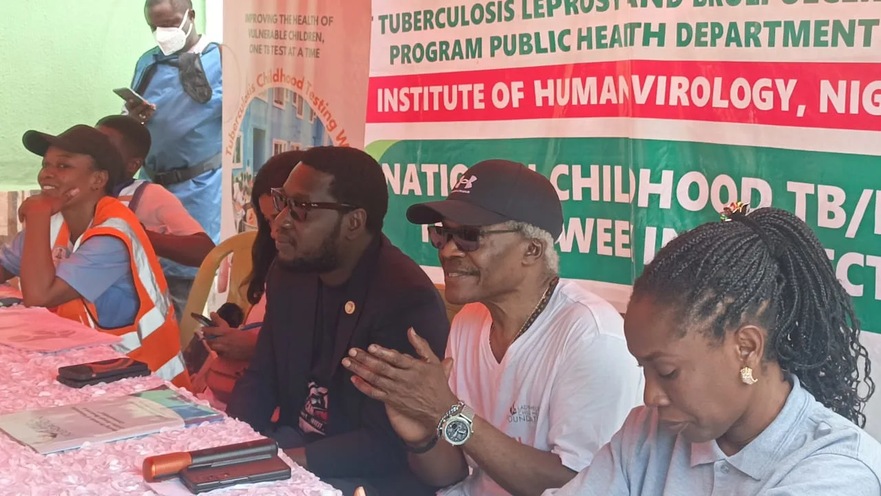 Guests of honor consisting of Dr. Benjamin Odeka, CEO of LHCHF and Dr. Garba Abdulrazak, Program Manager FCT TB, leprosy, buruli ulcer control, engaging with the flow of the program