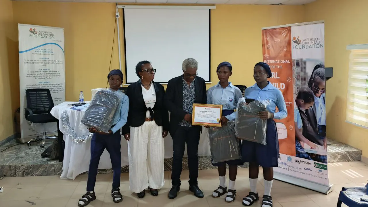 Dr Francesca Odeka and Dr Benjamin Odeka with second runner up debate team