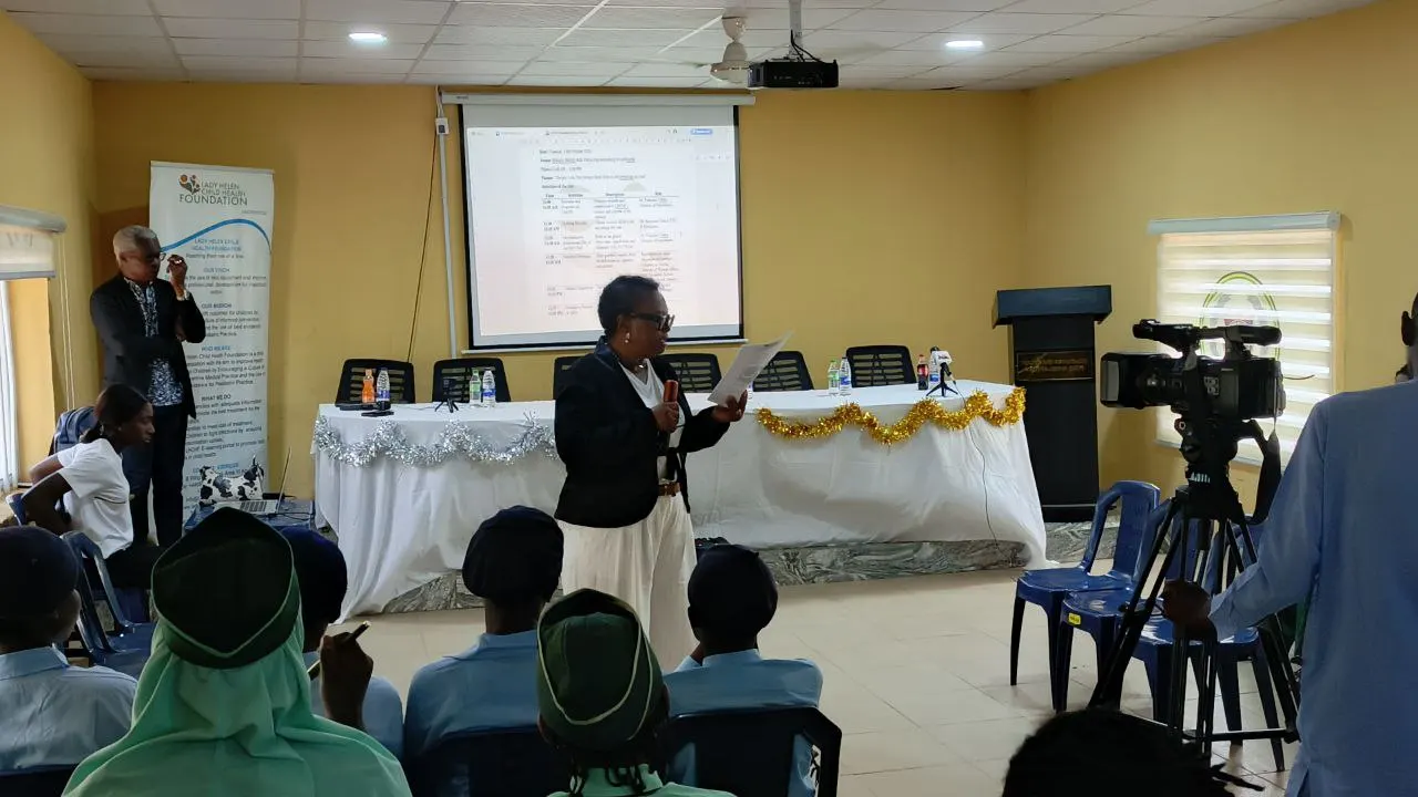Dr Francesca Odeka stating the debate rules and encouraging good sportsmanship among the students