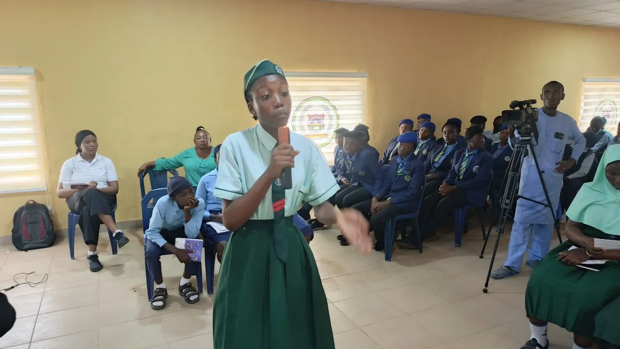 A member of the opposition stating her stance as she represents her school, Command Day Secondary School
