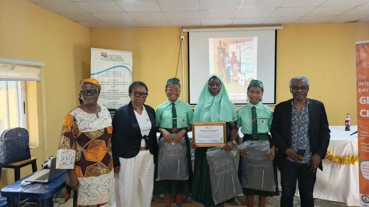 Dr Francesca with the debate coach and teachers, with the first place students