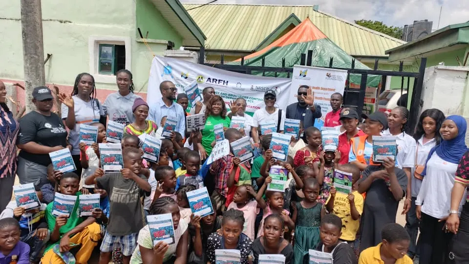 Children of Lomina Orphanage, with their proprietress, staff and volunteers of LHCHF and the TB testing officers marking the end of the TB testing week